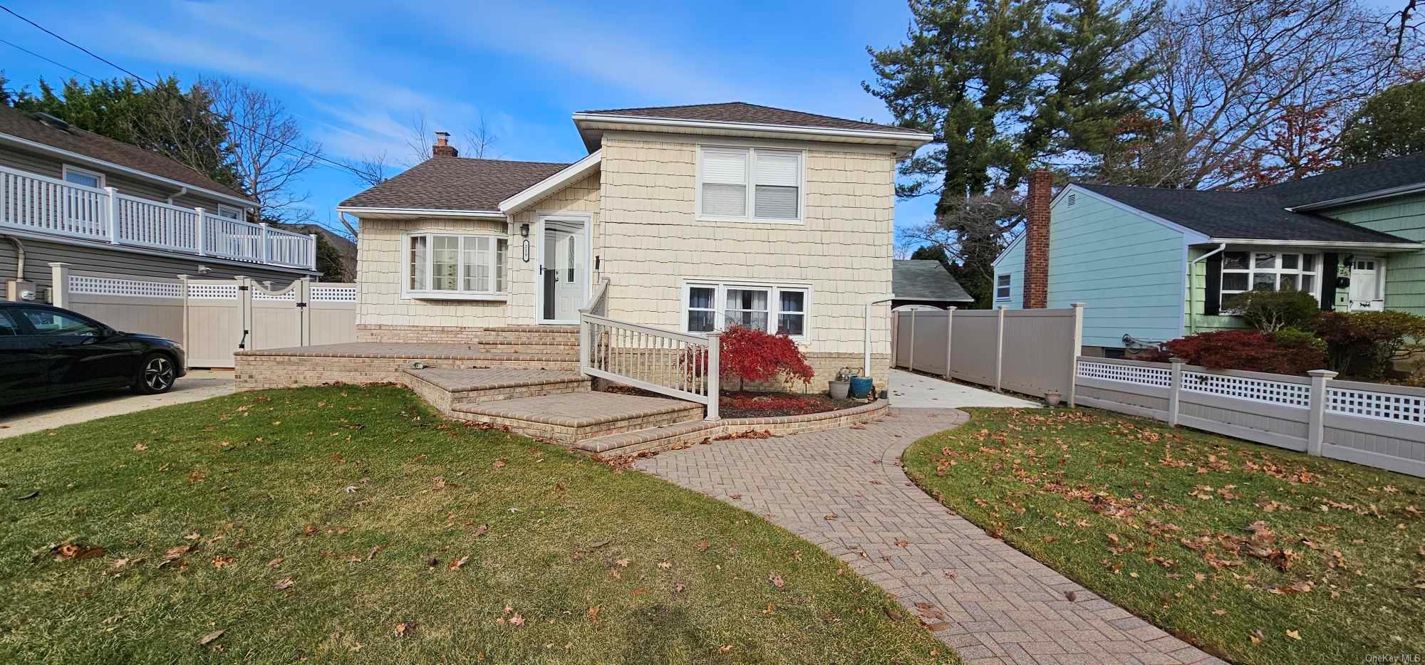 View of front of home with a front lawn