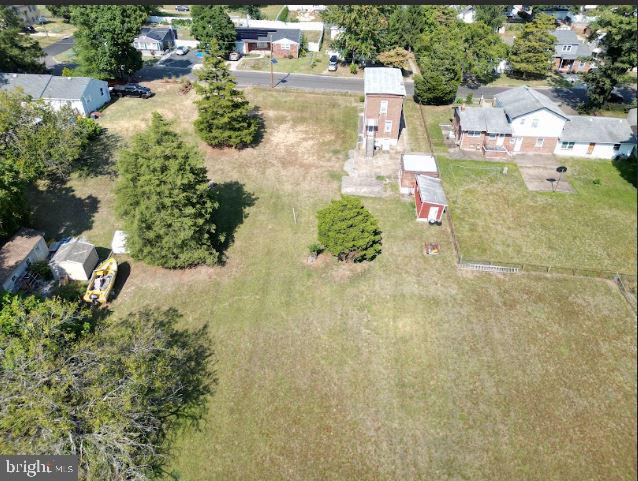 an aerial view of residential house with outdoor space