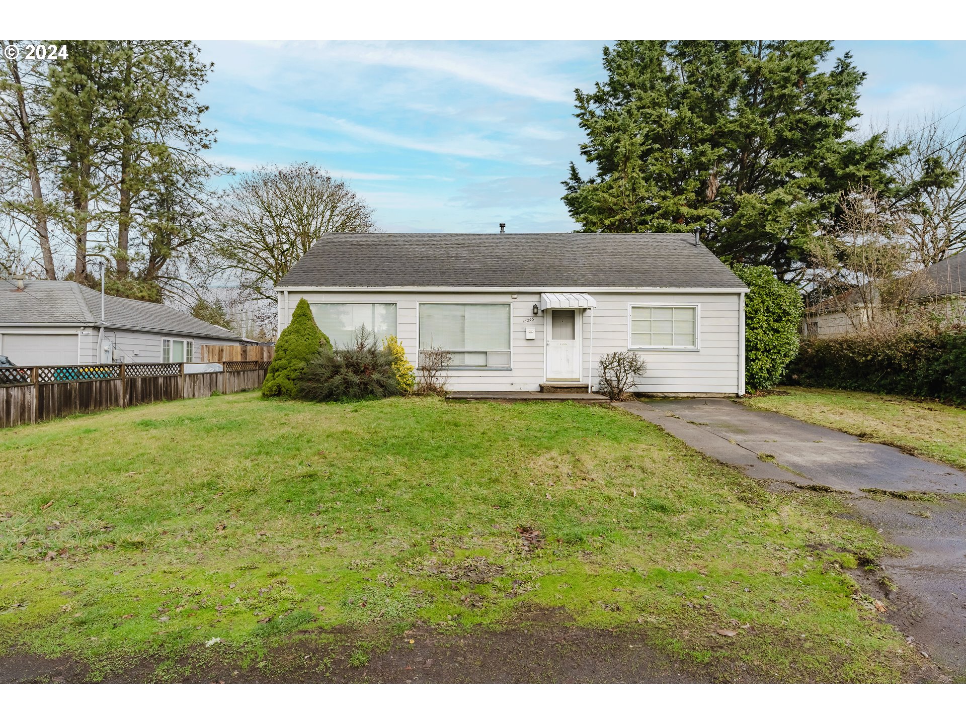 a view of a house with a back yard