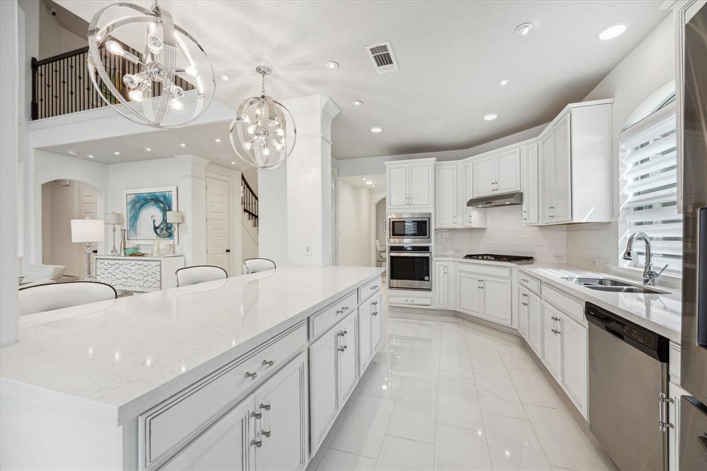 Large kitchen island with extra seating perfect for entertaining.