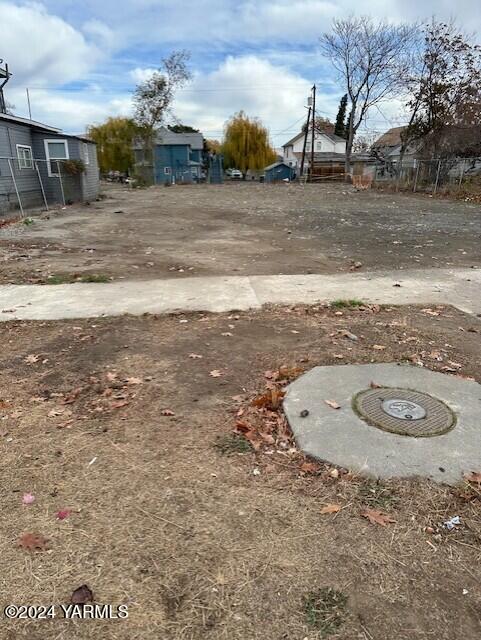 a view of a backyard of a house