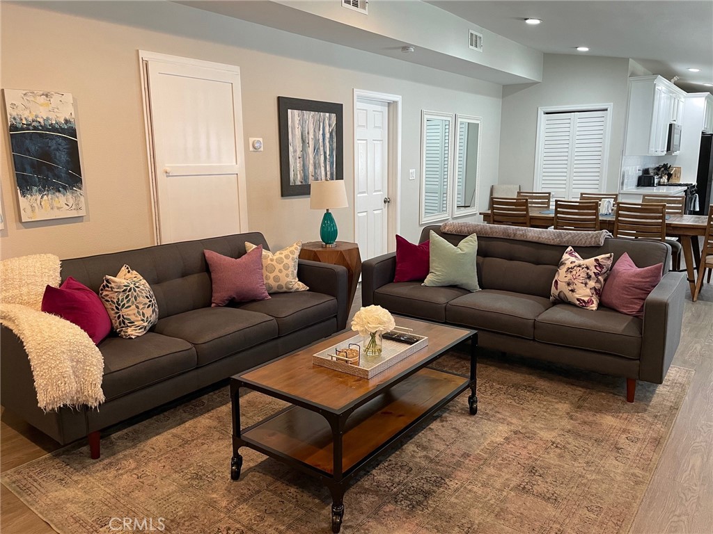 a living room with furniture and a couch