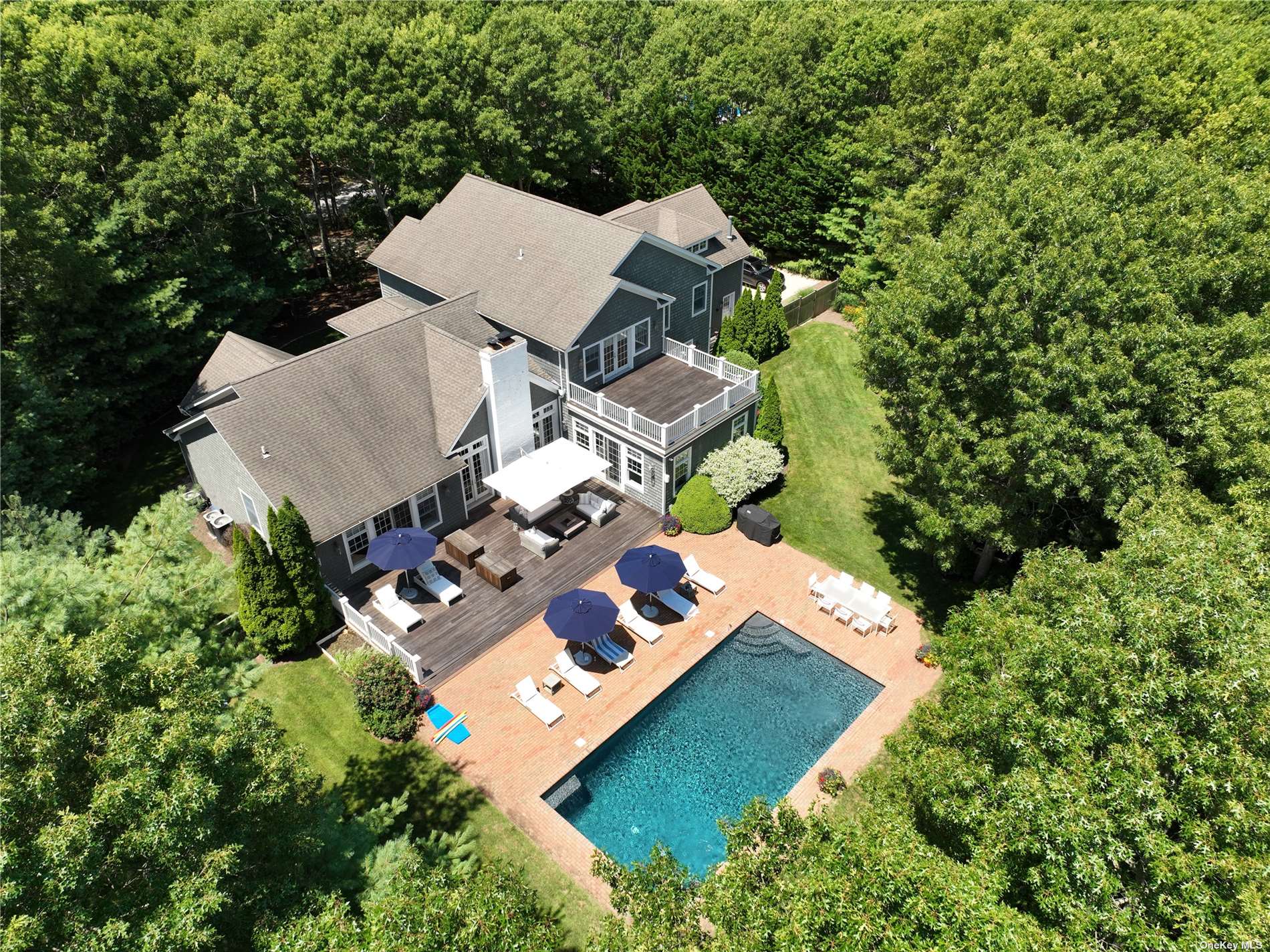 an aerial view of house with yard