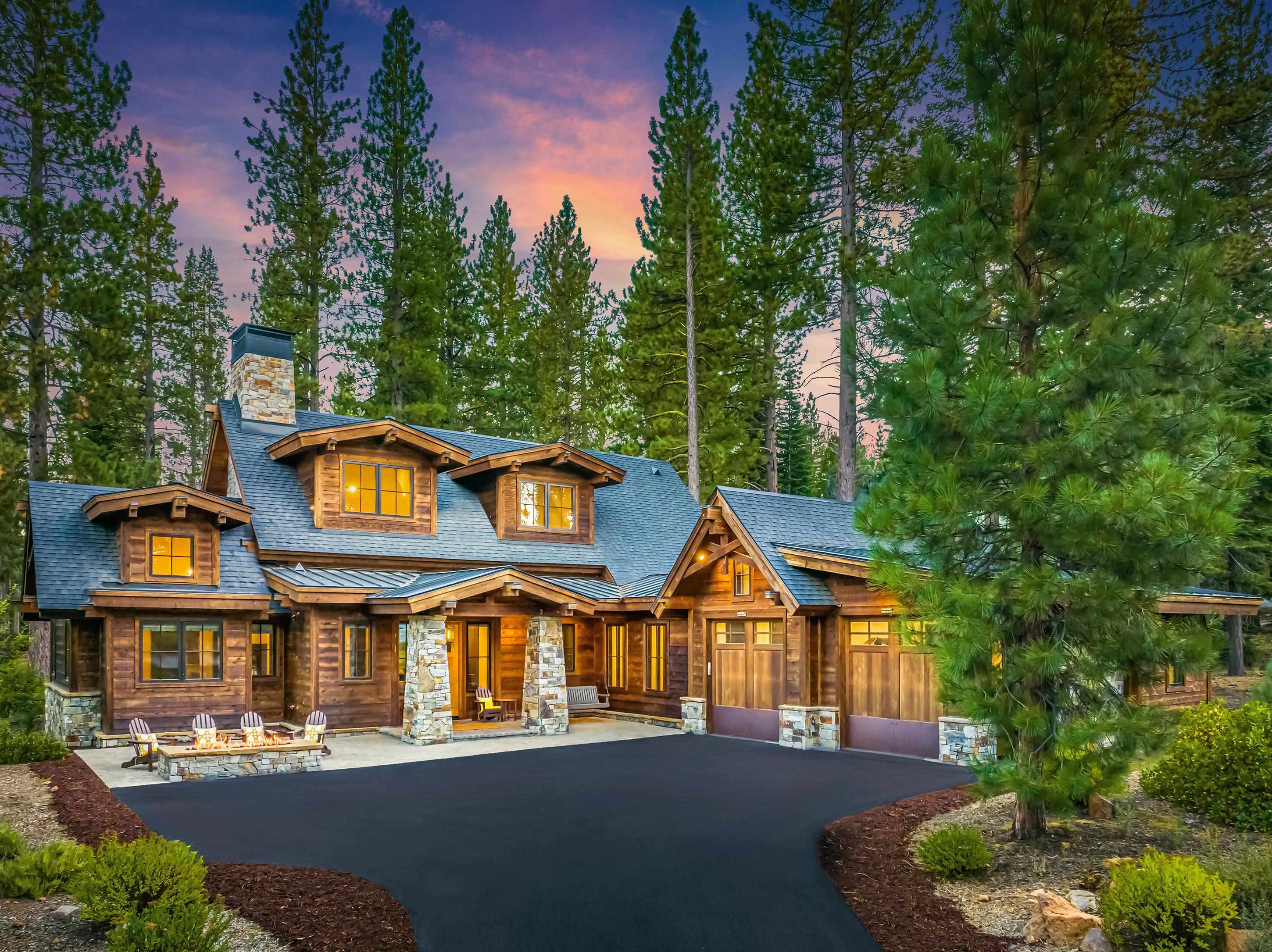 an front view of a house with a yard