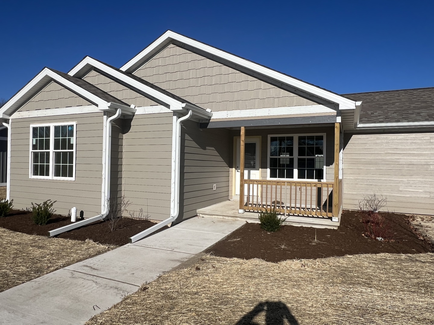 a front view of a house with a garage