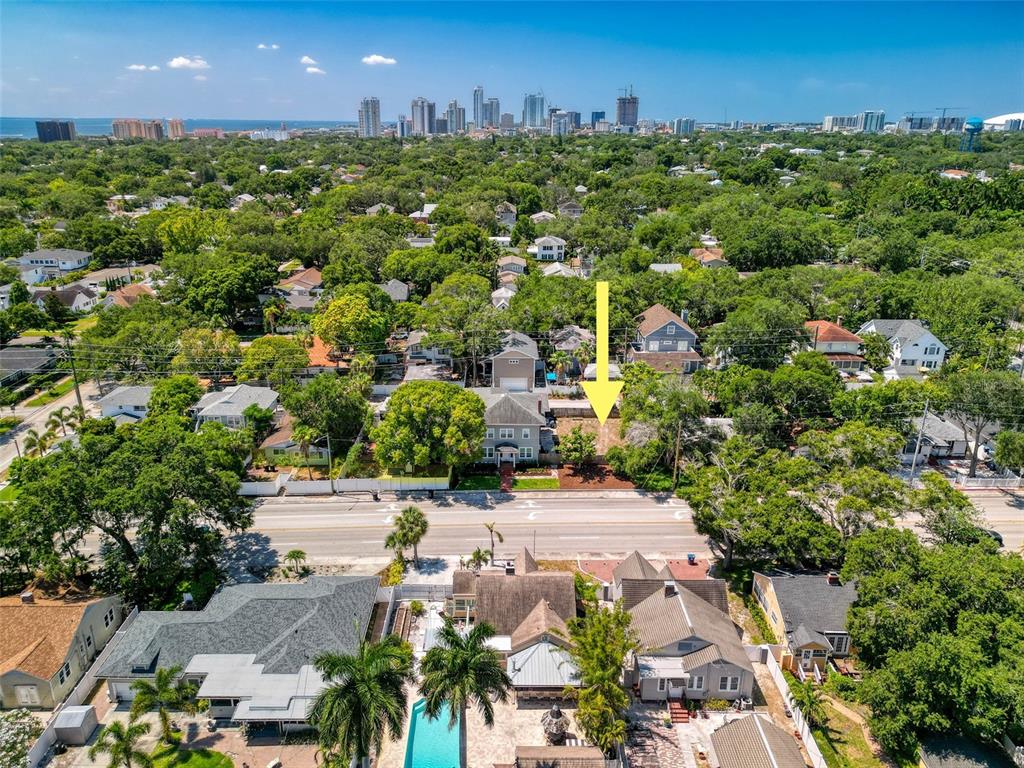 an aerial view of a city with lots of residential buildings