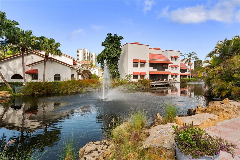 a view of a lake with building