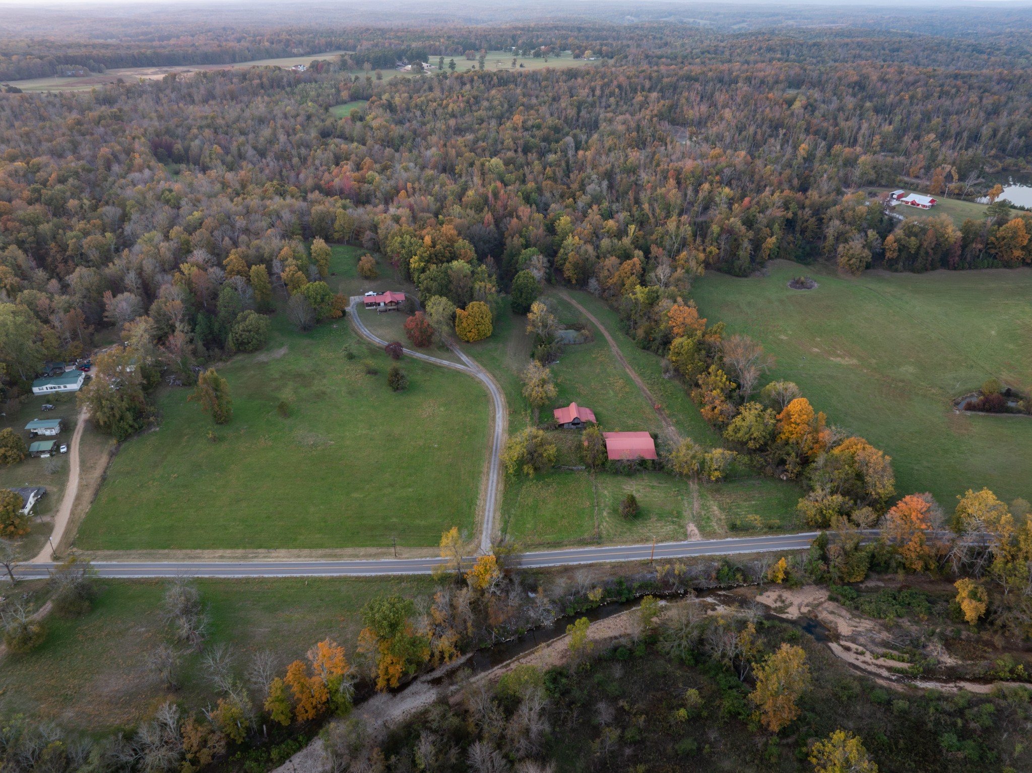 an aerial view of a houses with outdoor space