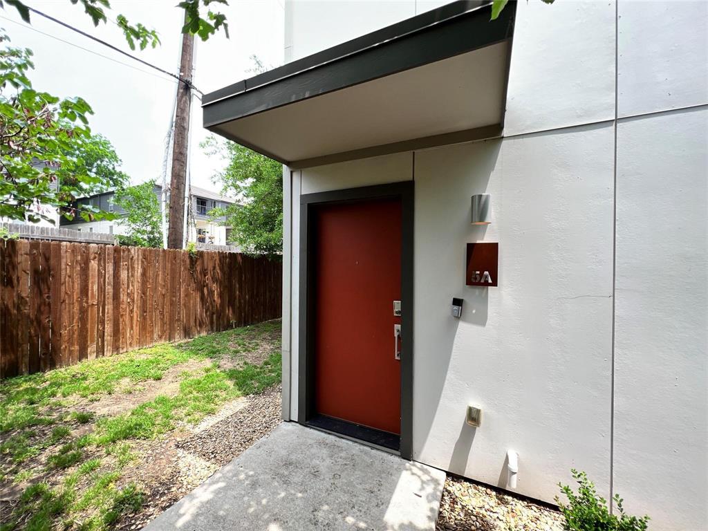 a backyard of a house with green landscape