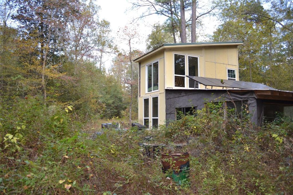 a house view with a outdoor space