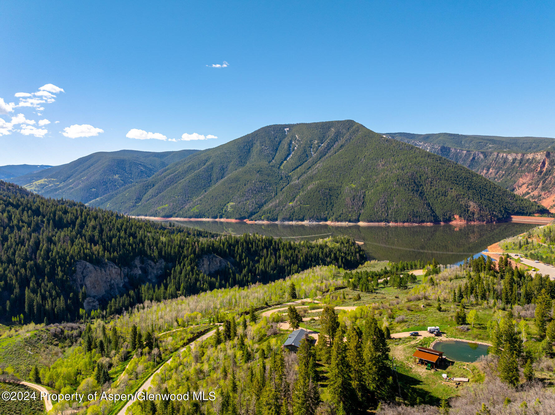 a view of a lake with a mountain in the background