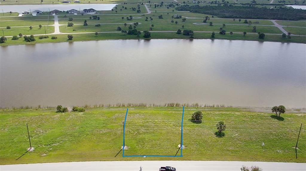 a view of a lake with a houses