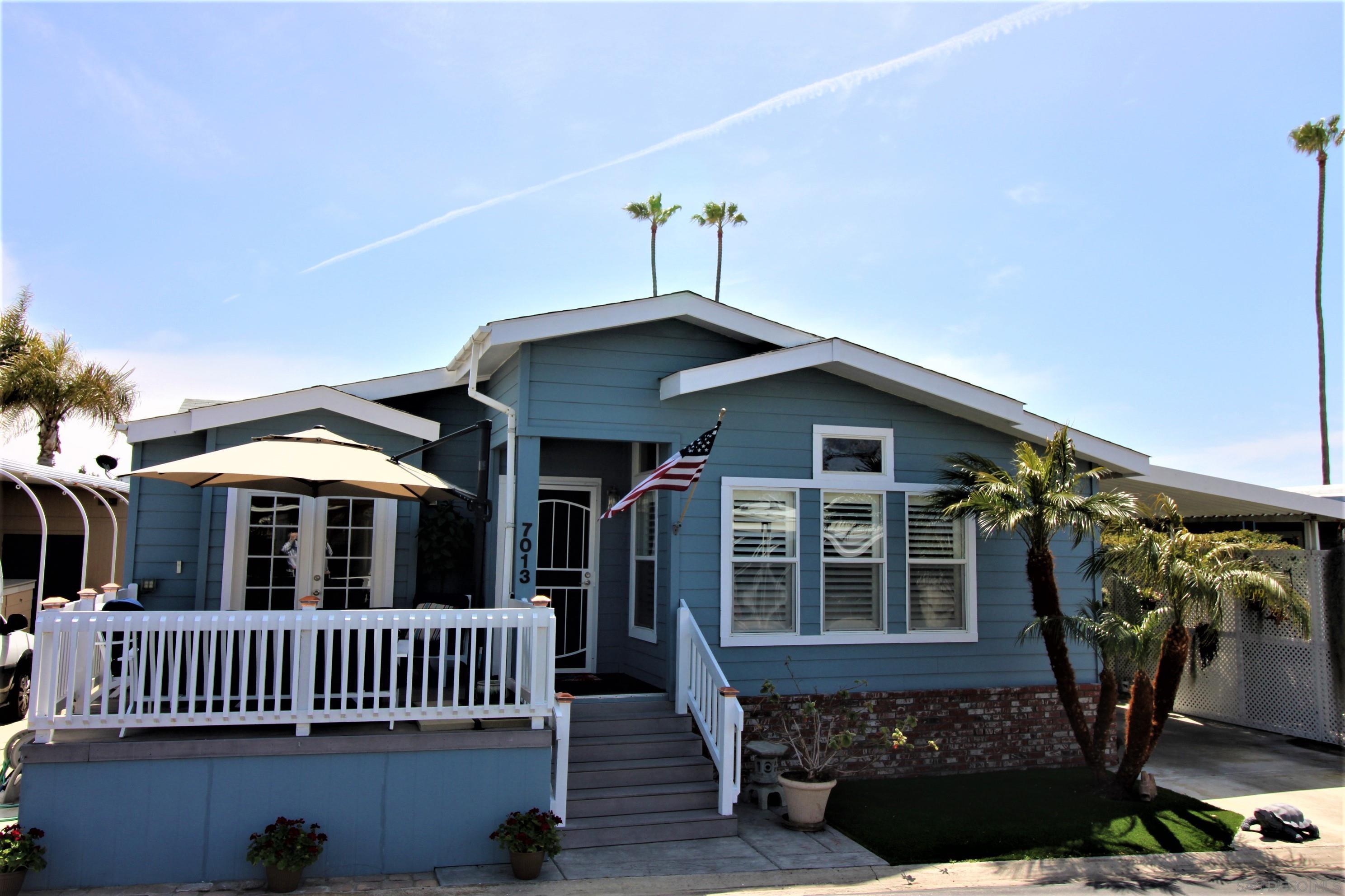 a front view of a house with balcony