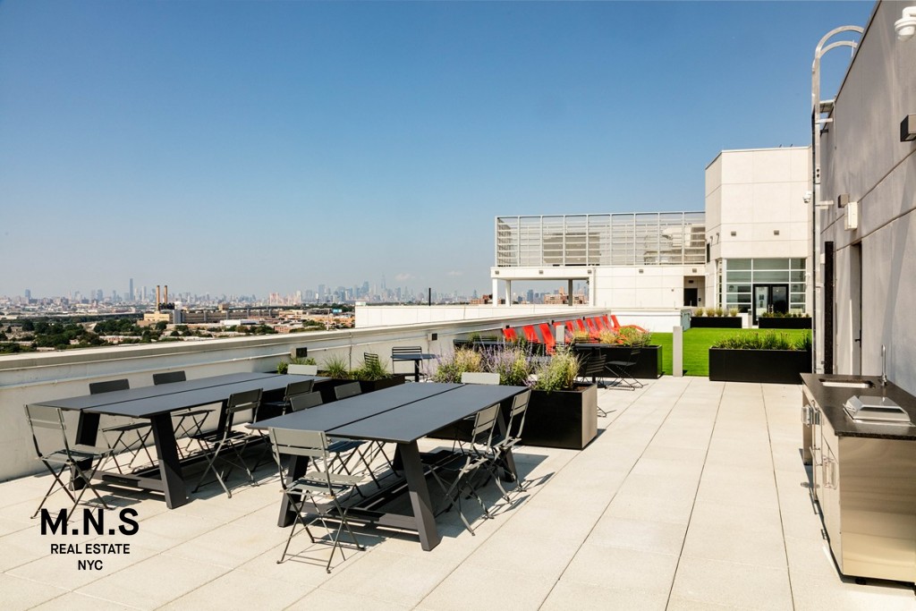 a patio with table and chairs