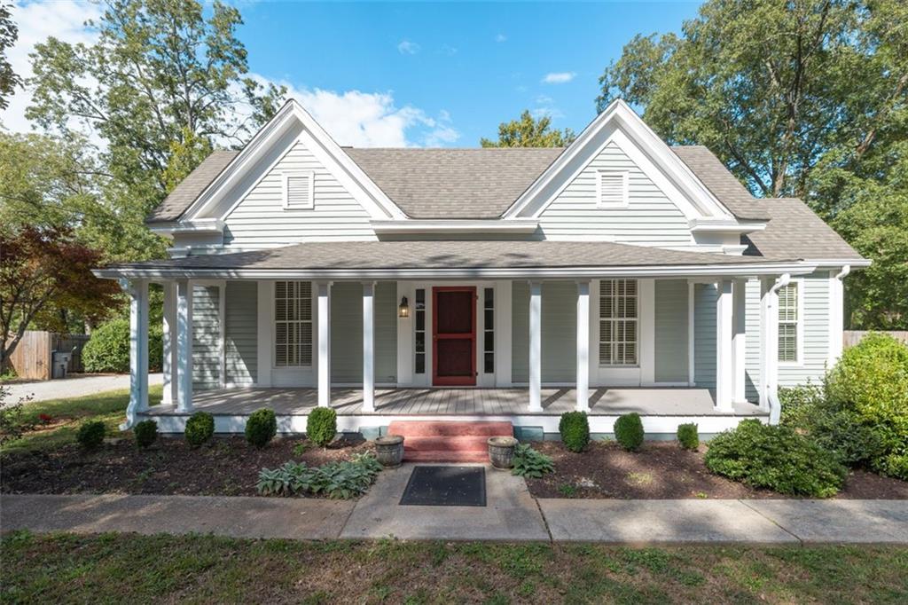 a front view of a house with porch