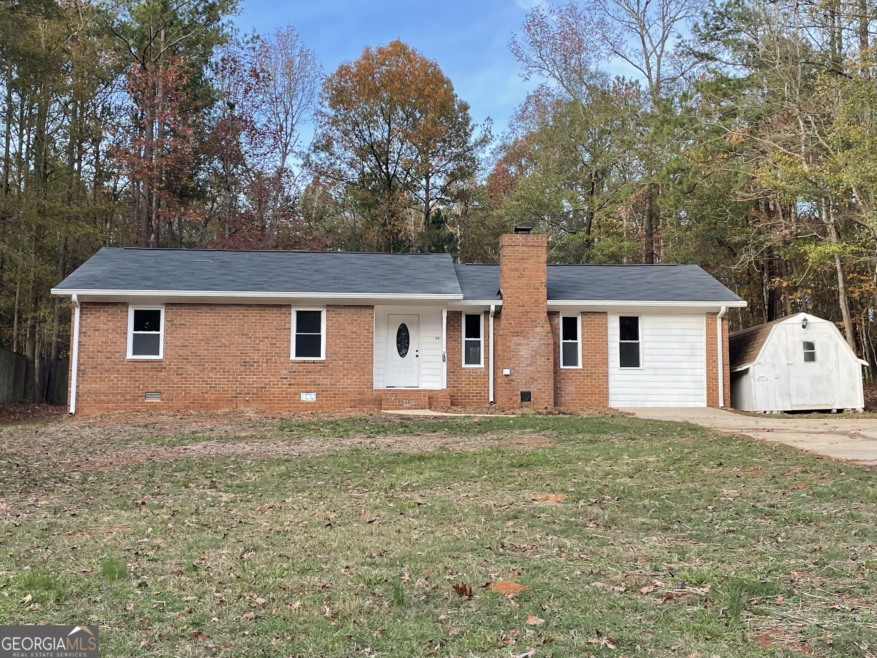 front view of a house and a yard