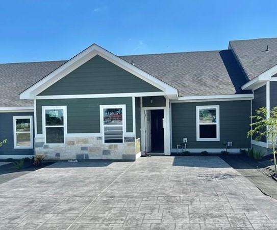 View of front of home featuring a patio