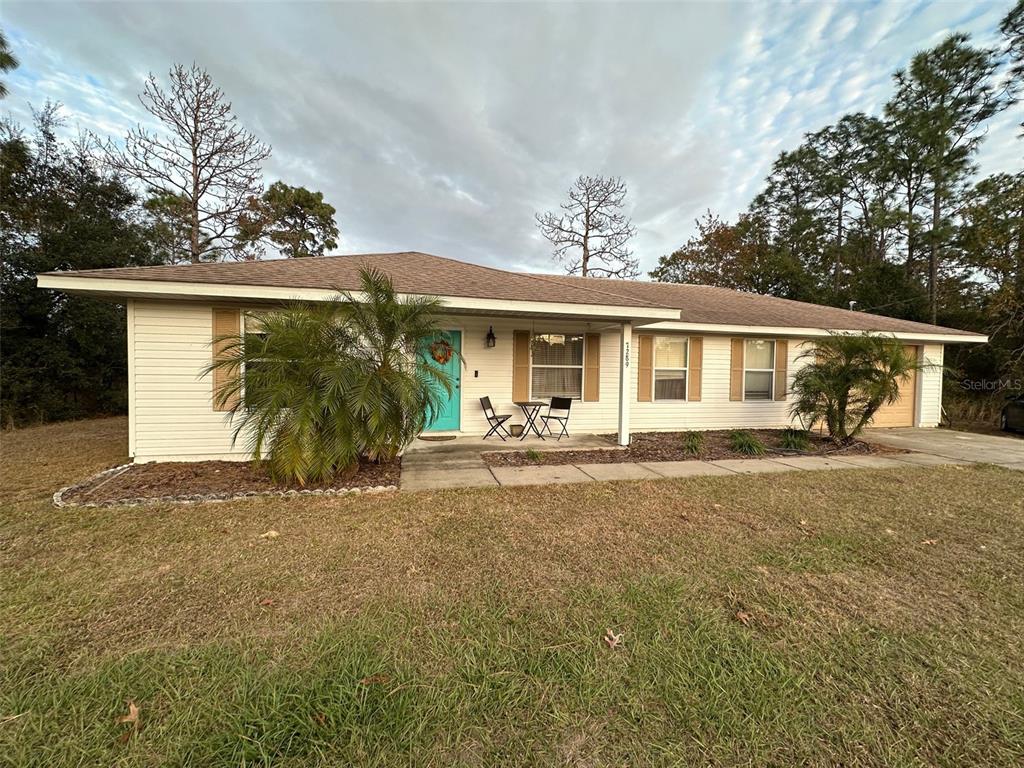 front view of a house with a yard