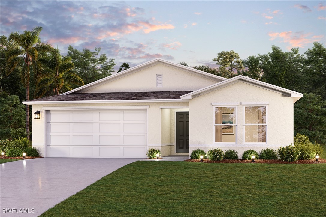 a view of a white house next to a yard and garage