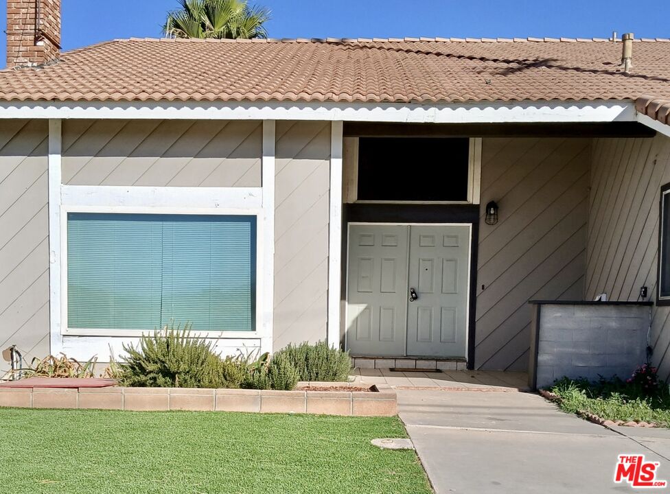 a view of house with a outdoor space