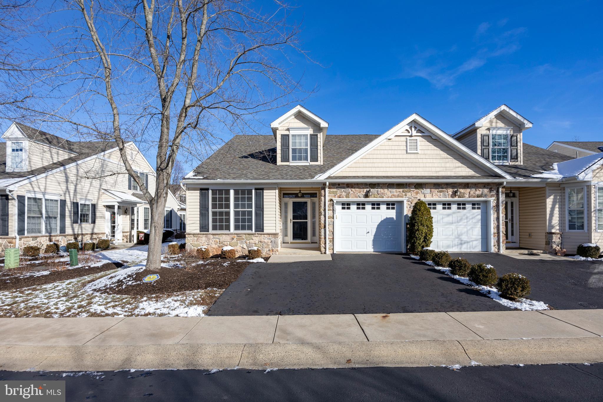 a front view of a house with yard