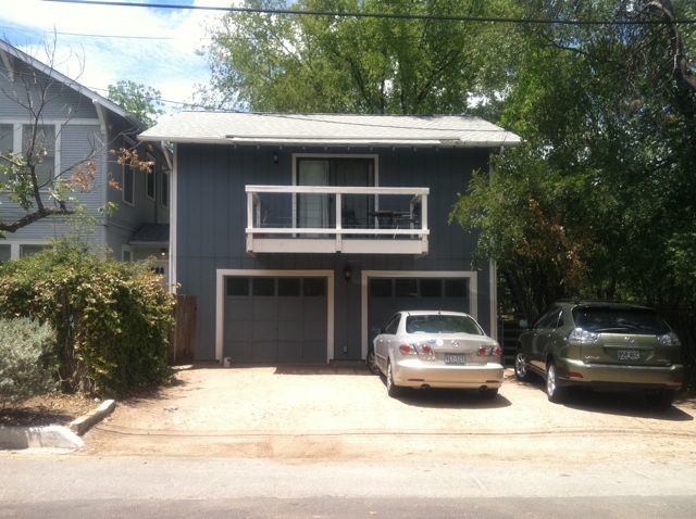 a car parked in front of a house