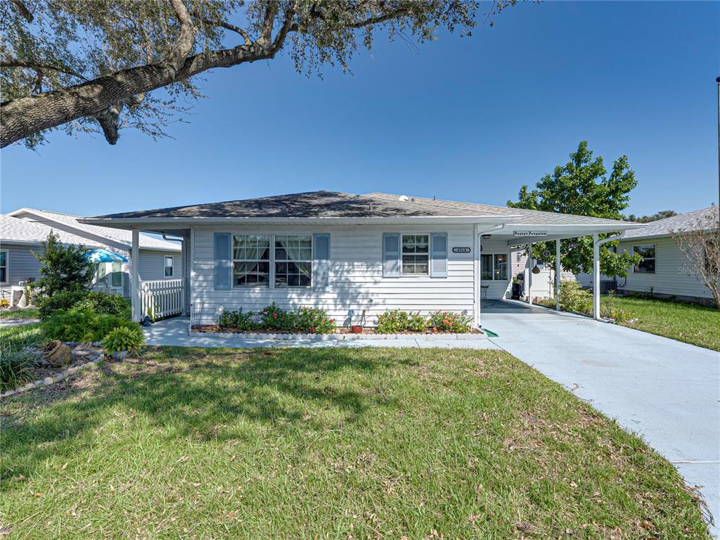 front view of a house with a yard