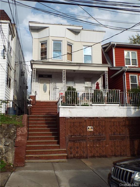 a front view of a house with balcony