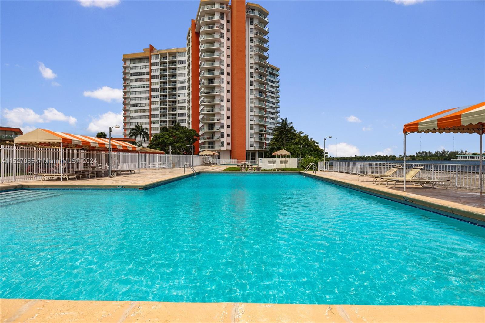 a view of outdoor space with swimming pool and outdoor space