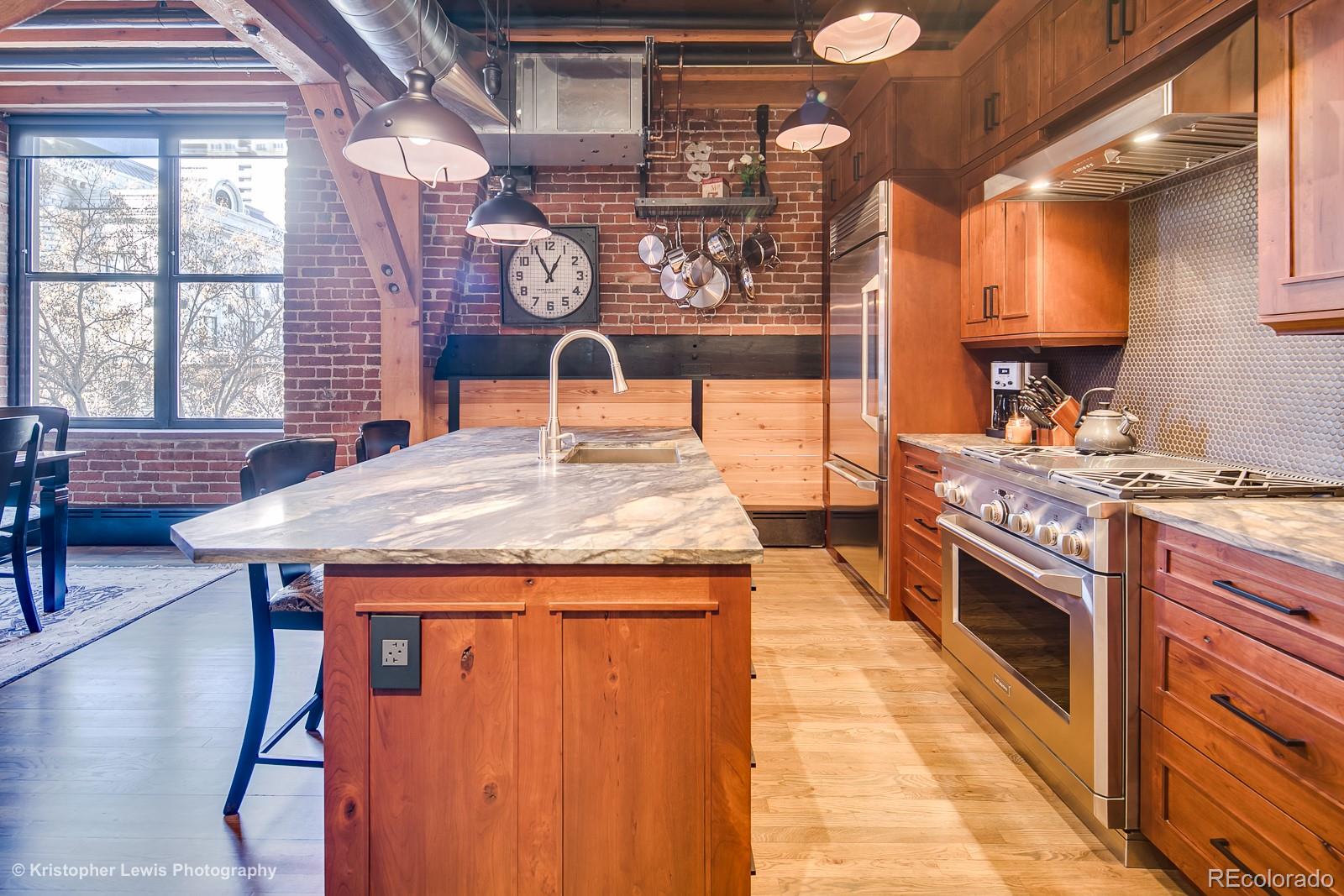 a kitchen with a stove and a table