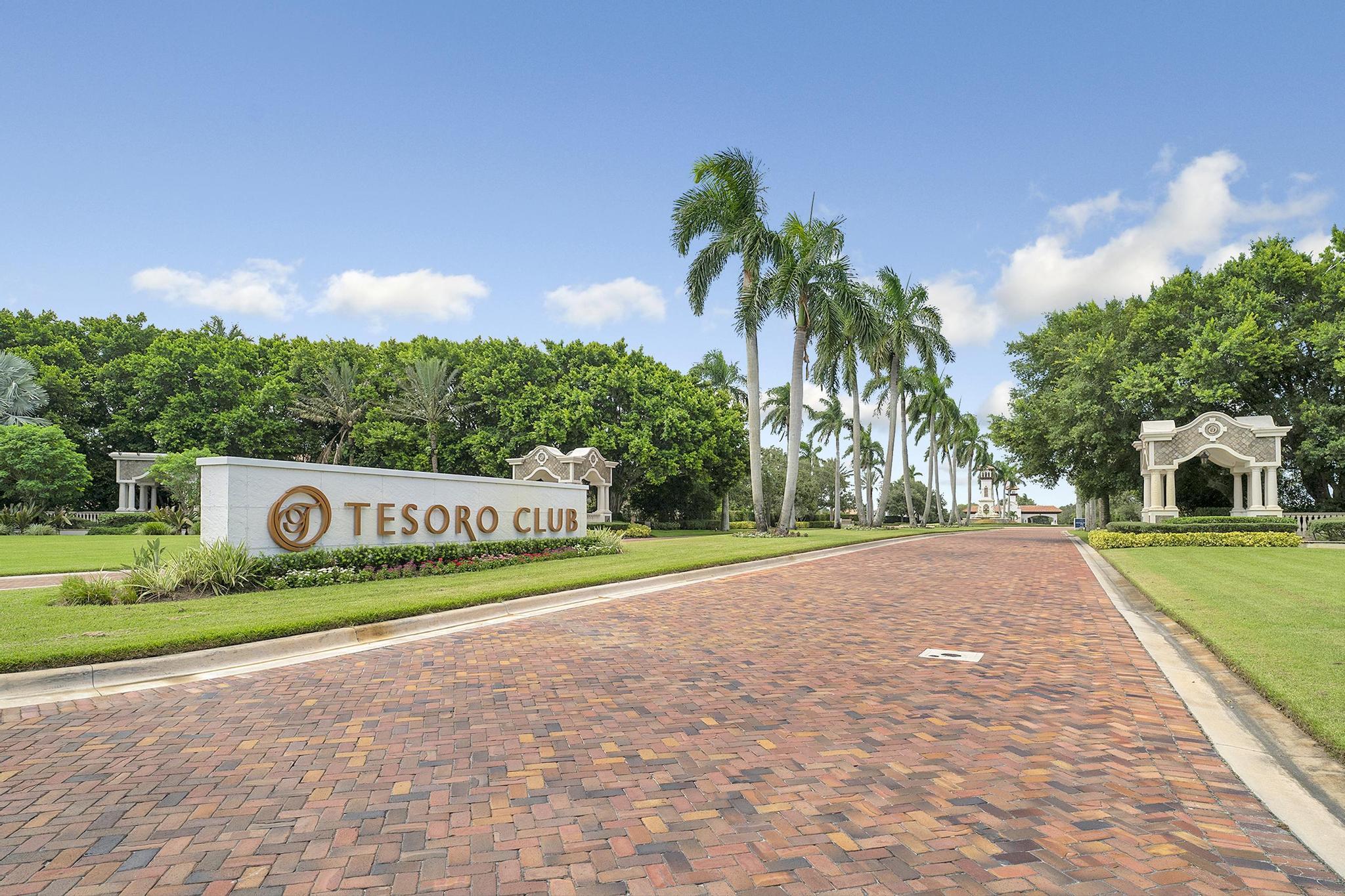 a view of a park that has a sign board