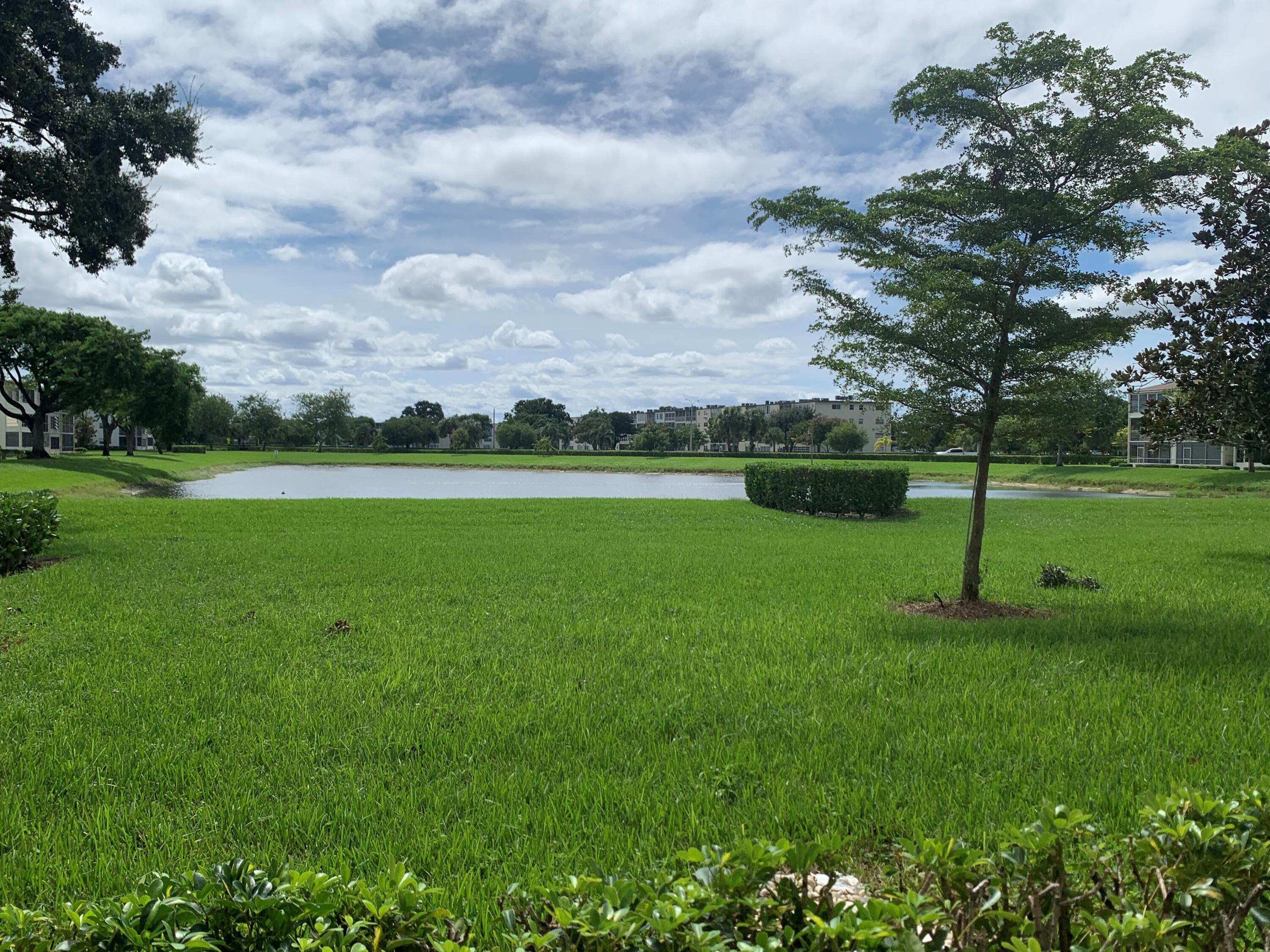 a view of a golf course with a garden