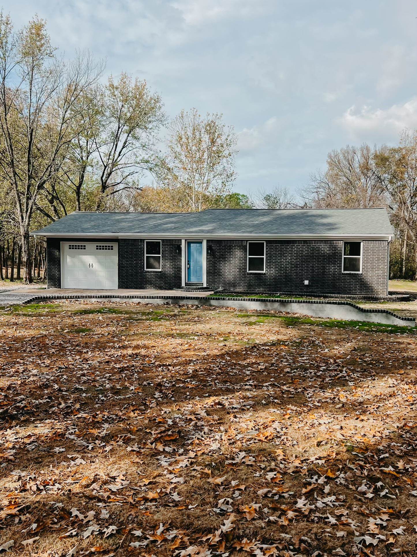 Ranch-style house with a garage