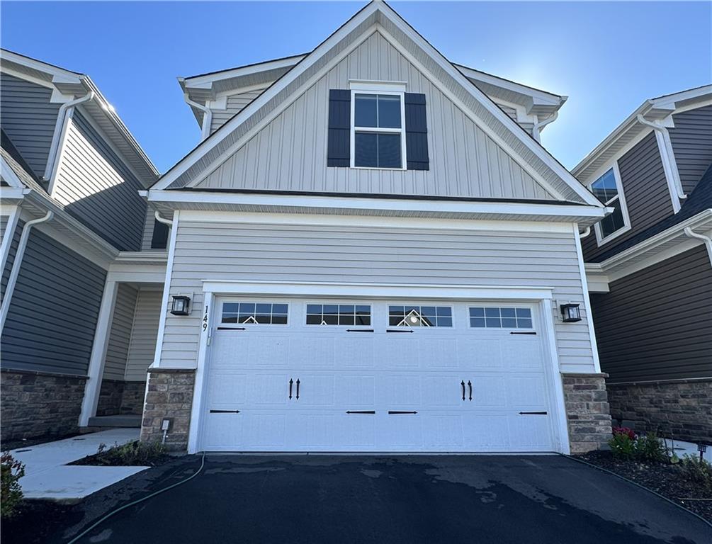 a view of a house with a garage