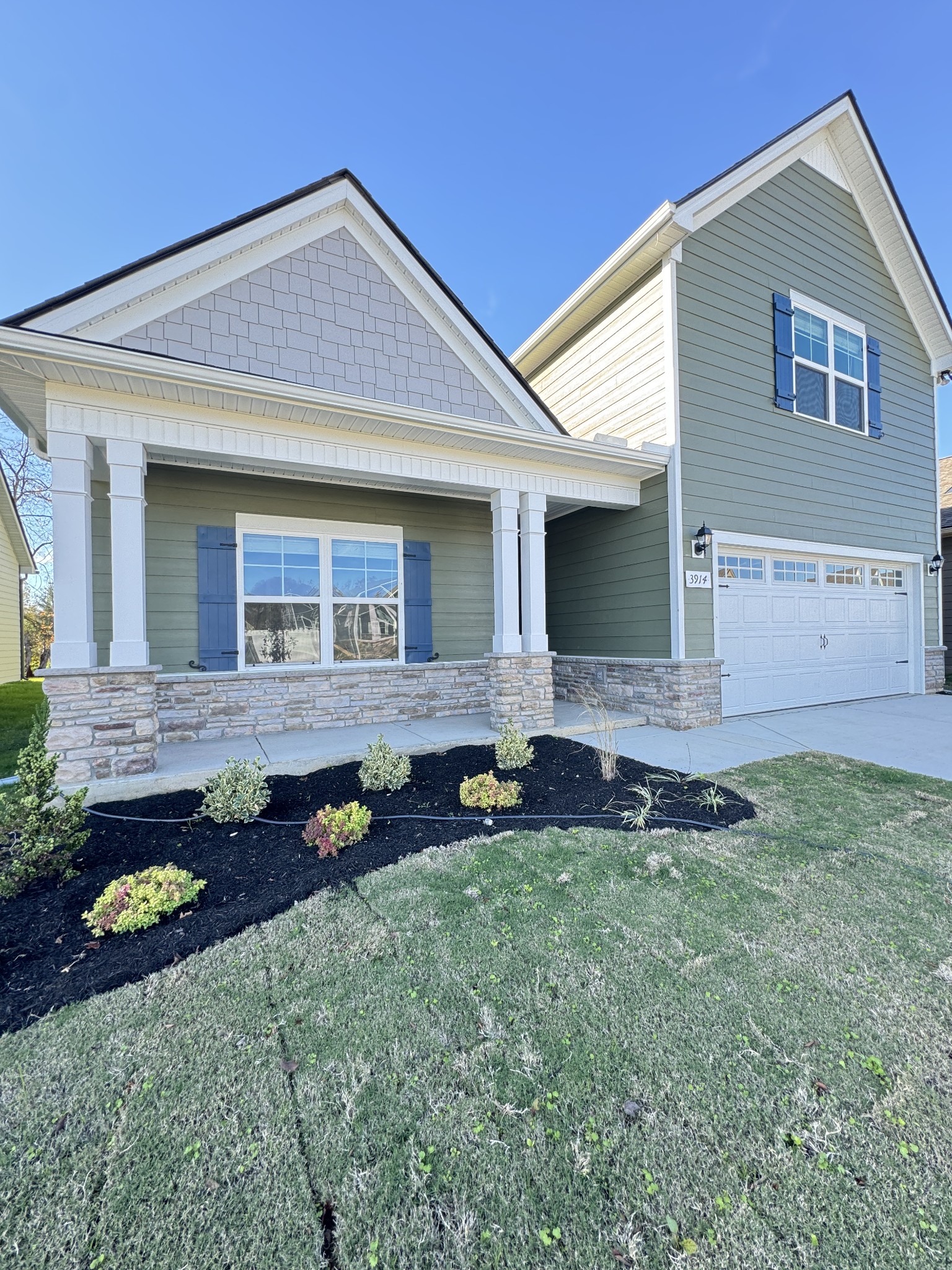 a house view with a garden space