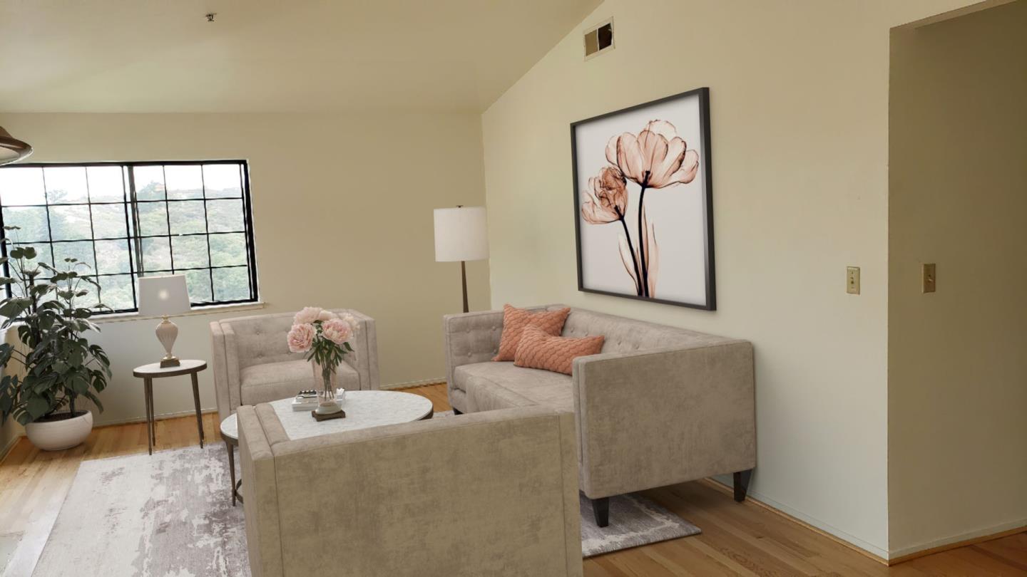 a living room with furniture and window