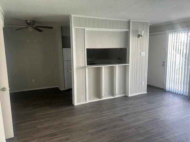 a view of a livingroom with wooden floor