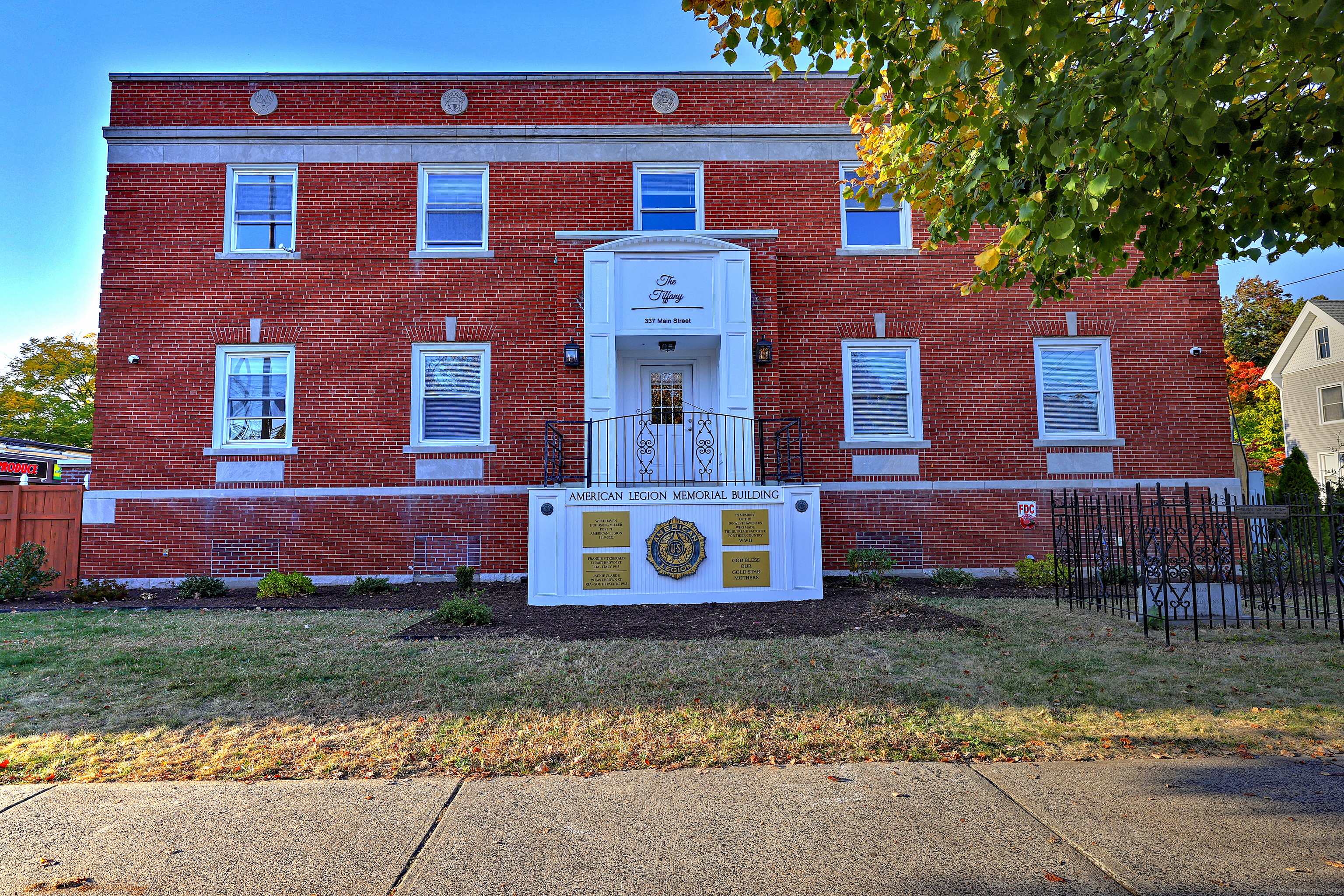 front view of a house with a yard