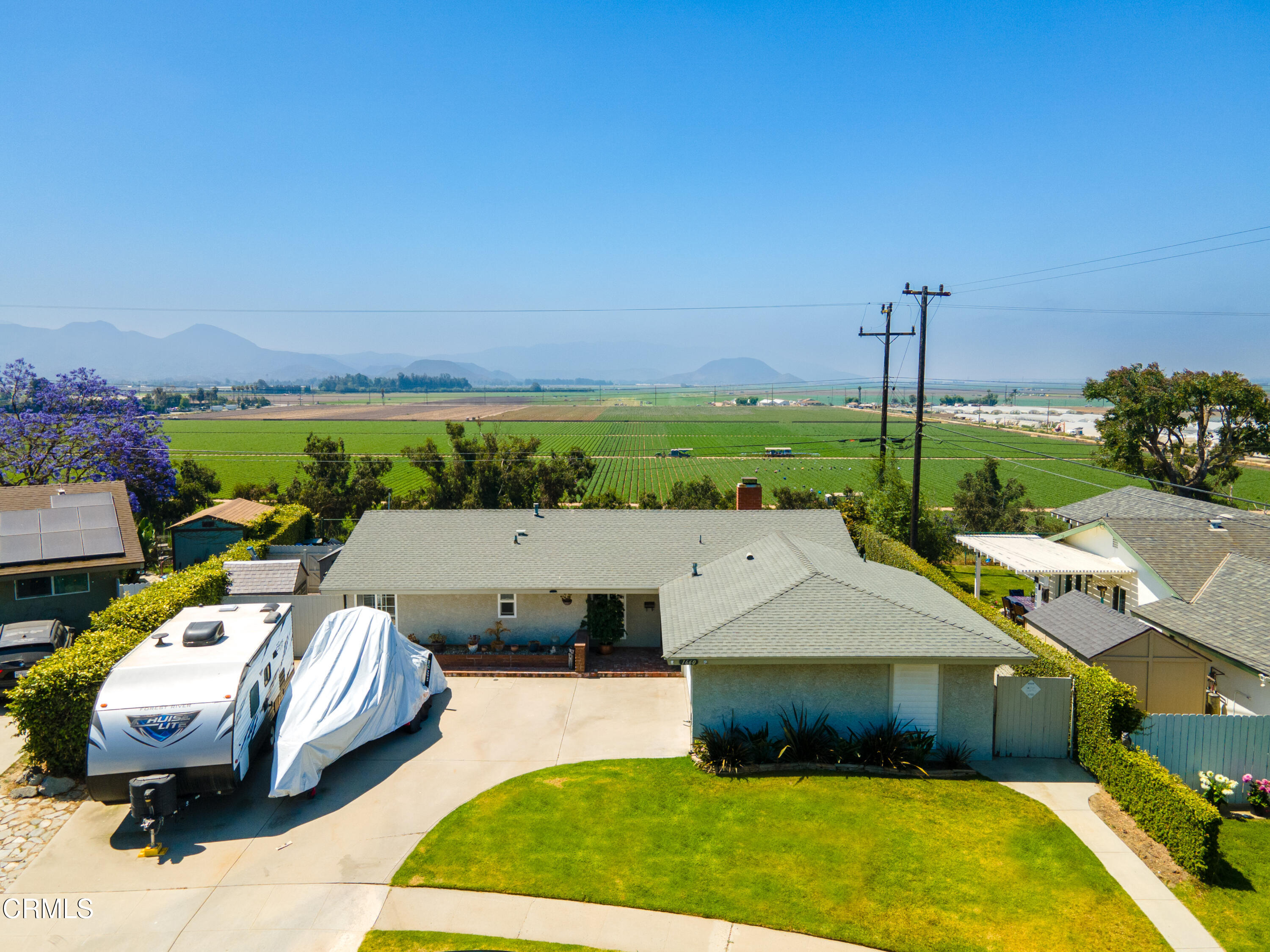 a aerial view of a house with swimming pool and a terrace view