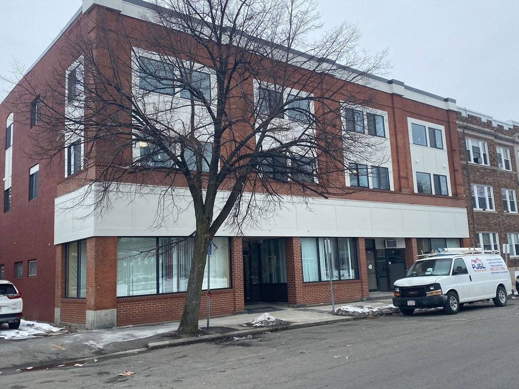 a car parked in front of a building