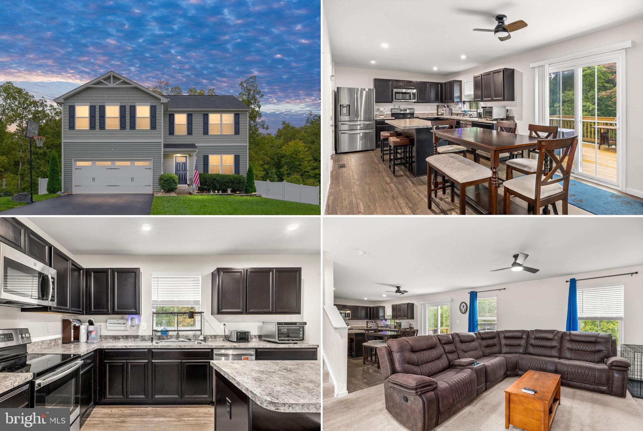 a living room with stainless steel appliances kitchen island a table and chairs in it