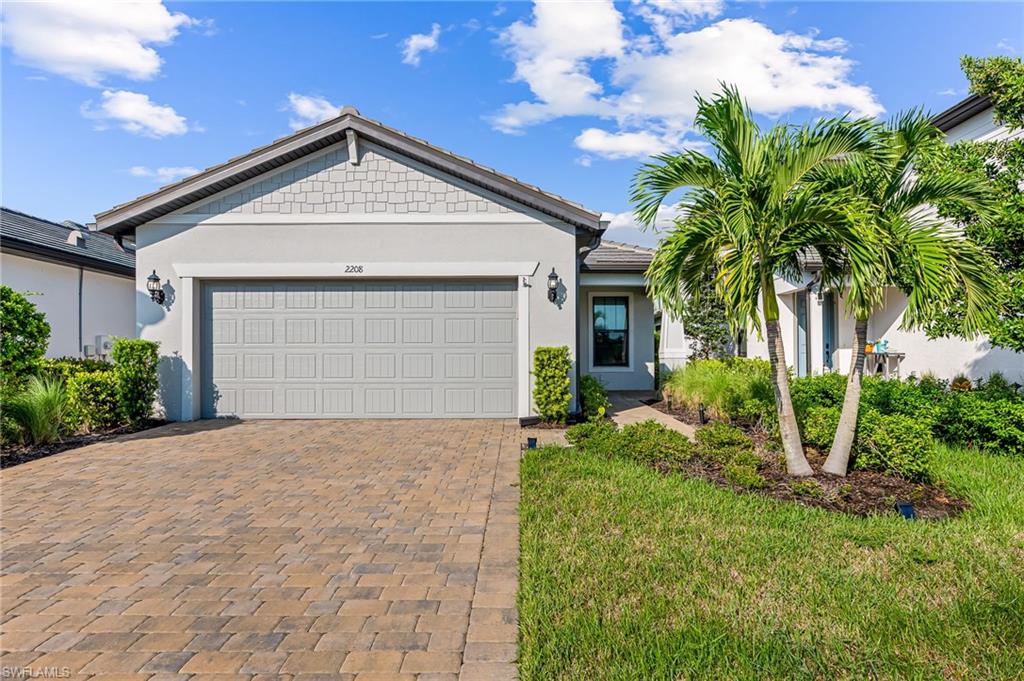 Ranch-style home with a garage