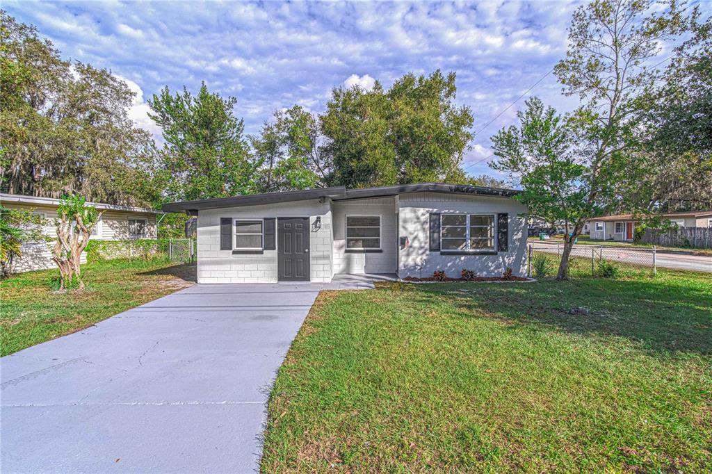 front view of a house with a yard