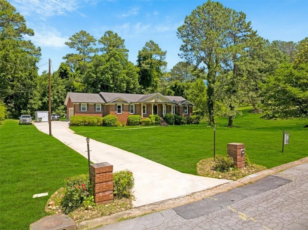 a view of a house with garden