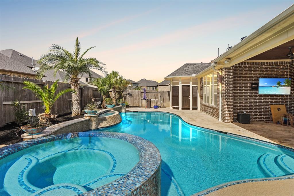 a view of a house with swimming pool