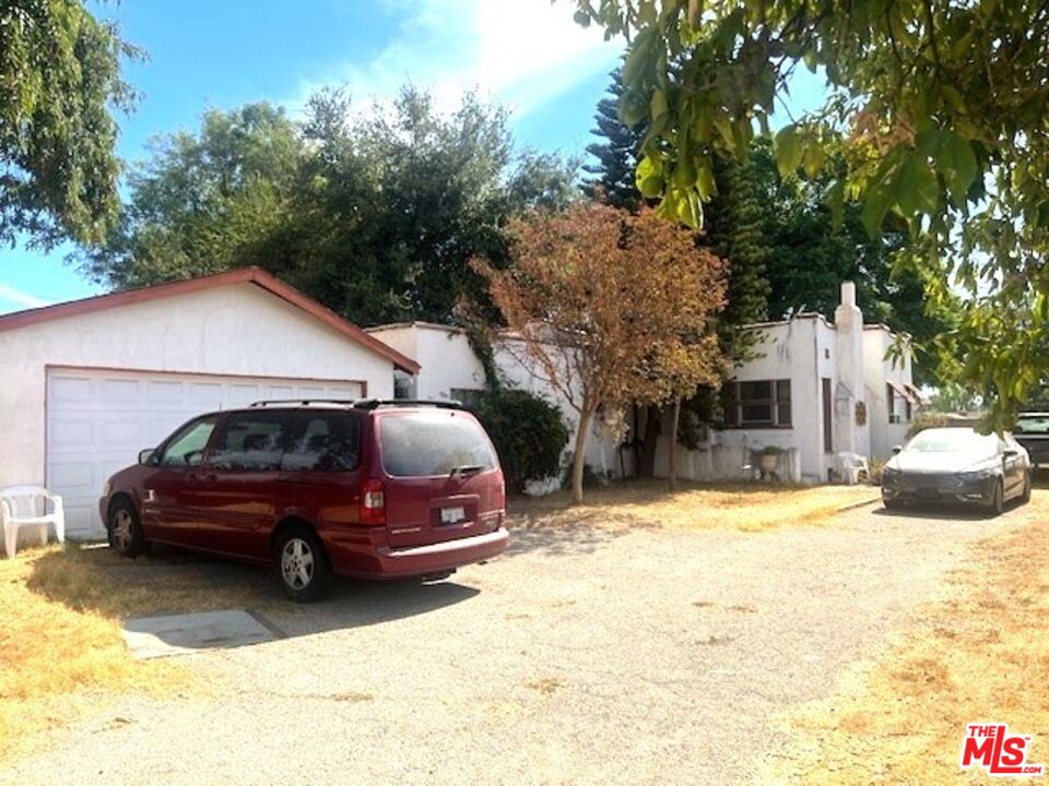 a car parked in front of a house