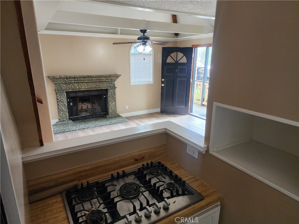 a kitchen with a stove and a refrigerator