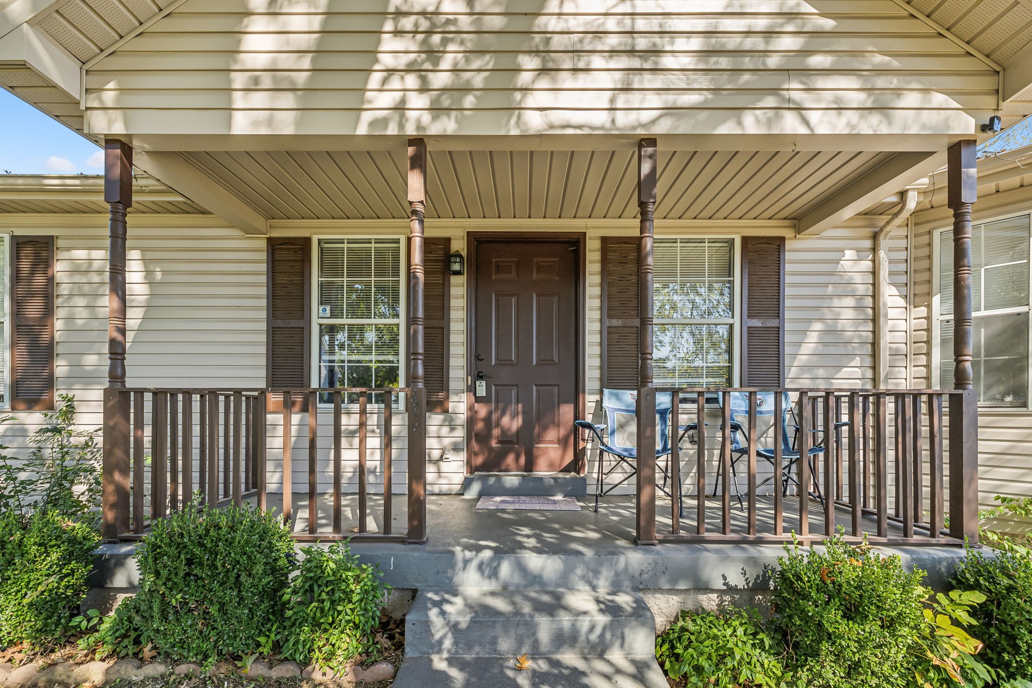 a front view of a house with a porch