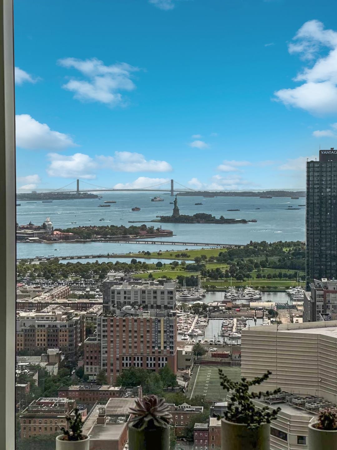 a view of a city with ocean view