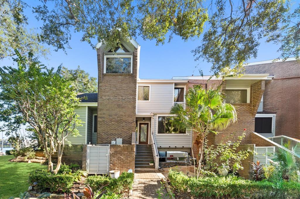 front view of a house with a garden